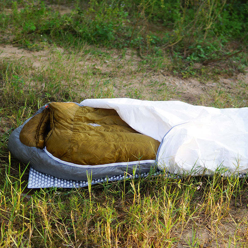 Saco de dormir ultraligero para camping DuPont TYVEK: transpirable y resistente a la humedad.
